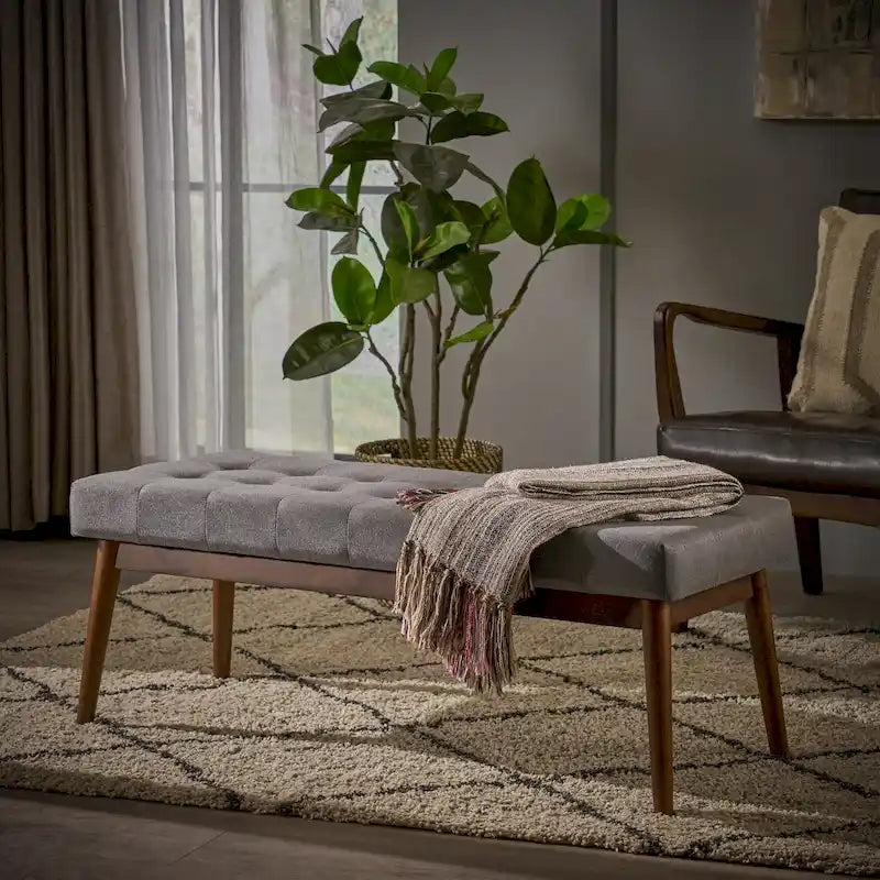 Banc ottoman en tissu capitonné