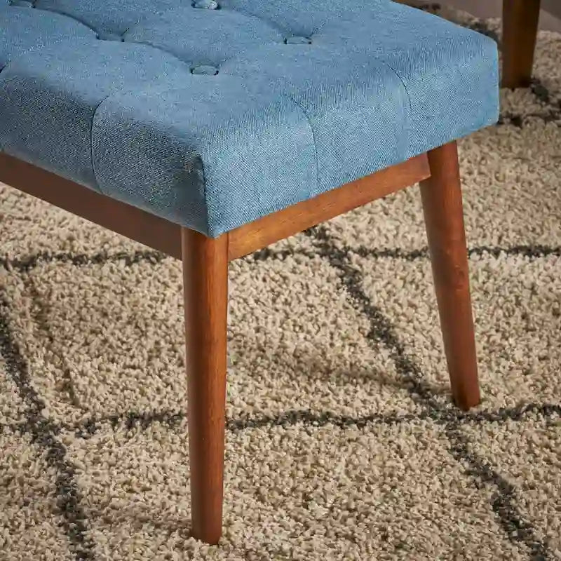 Banc ottoman en tissu capitonné