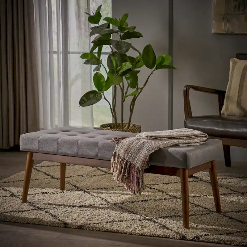 Banc ottoman en tissu capitonné