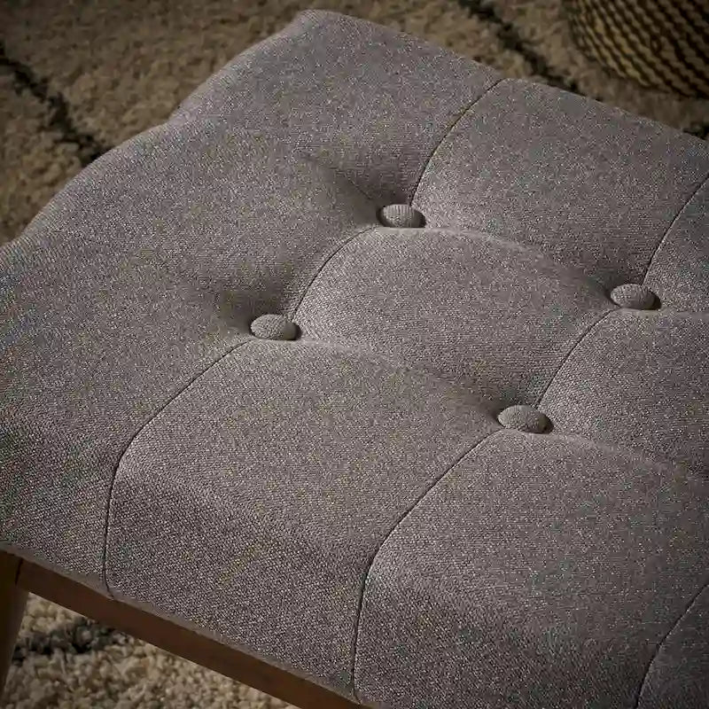 Banc ottoman en tissu capitonné