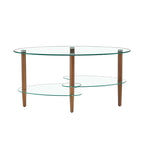 Table basse ovale en verre avec pieds en bois de chêne, rangement à deux niveaux