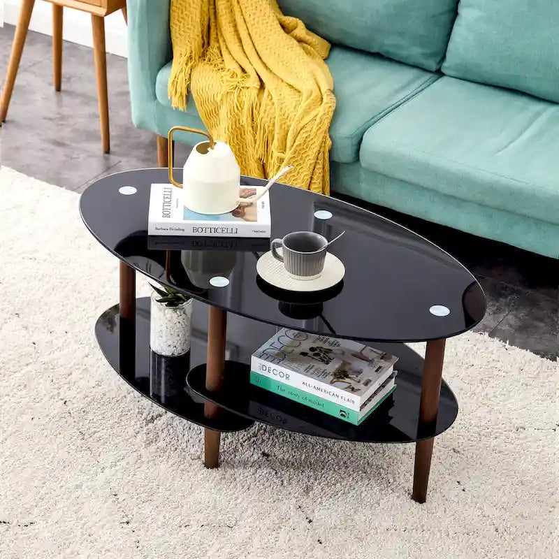 Table basse ovale en verre avec pieds en bois de chêne, rangement à deux niveaux